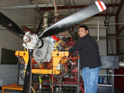 Mechanic Ruben Gutierrez performs a post-test check of the new Trace engine.