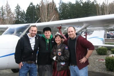 Touch&Go7 CELEBRATING IN STYLE: Meg Godlewski commemorates her 1,000th hour of dual given with students Matt "Pegasus" Tudhope (who had his first solo March 16), Chris "Bulldog" Caywood, and Dan Lewis.