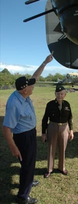 Sam Mastrogiacomo and fellow Army Air Corps vet Joseph Reus, right, check out the tail gunner position of a B-24 on display at American Aero in New Smyrna Beach, Fla. Mastrogiacomo served as a tail gunner on a B-24.